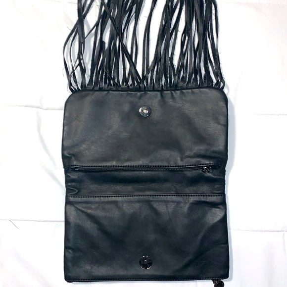 BCBGeneration black clutch bag. Snaps closed hanging leather strings. 2 zippers - Picture 8 of 9